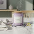 Lavender and Chamomile Soy Wax Candle in lilac jar with lavender sprigs and chamomile flowers